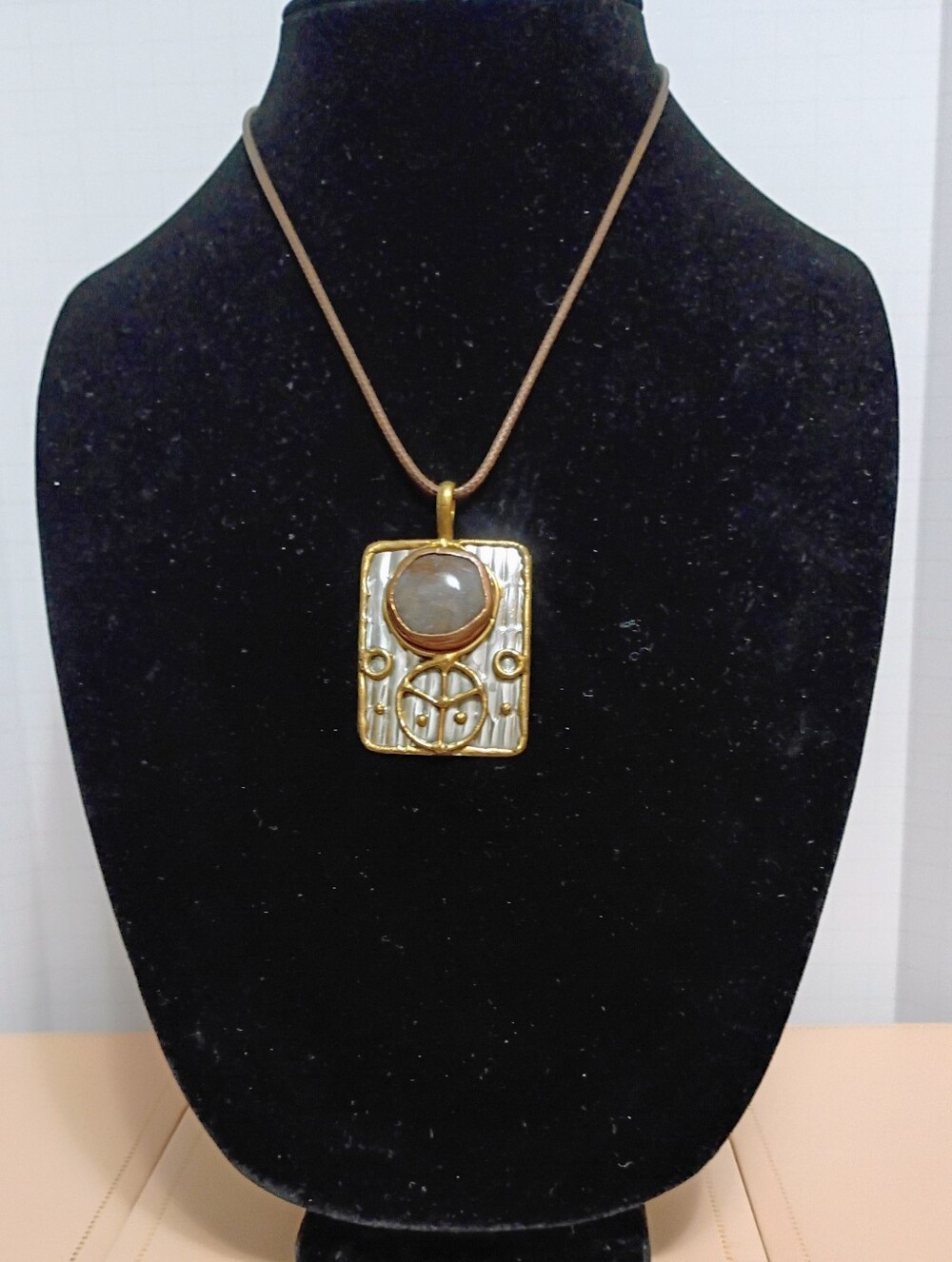 Gold & Silver Toned pendant